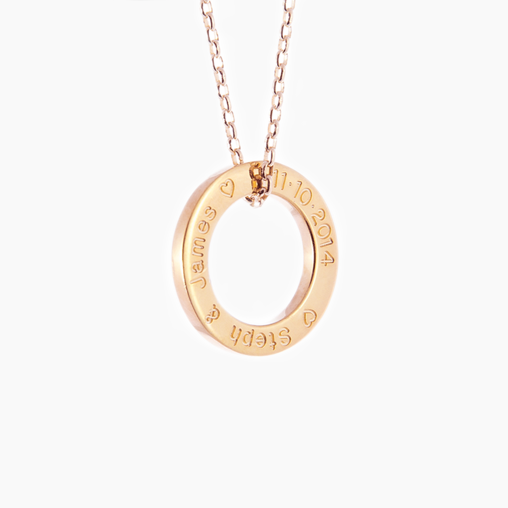 Wedding jewellery engraved with dates and names on a rose gold hoop