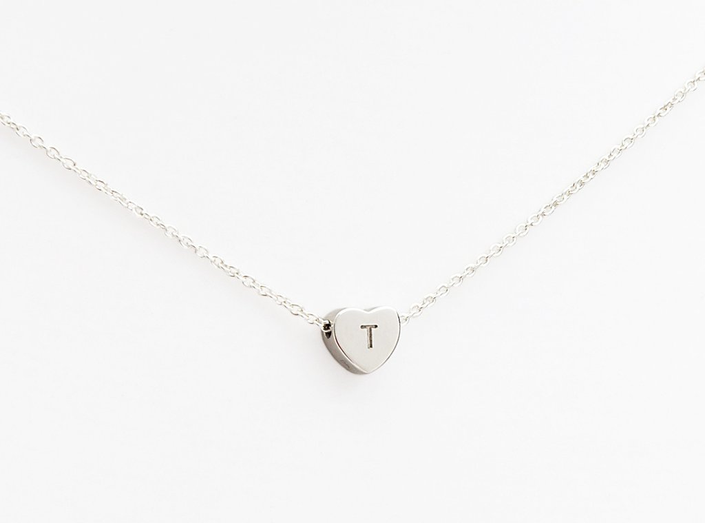 Heart and dainty chain engraved with a letter